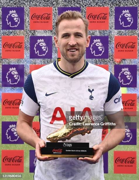 Harry Kane of Tottenham Hotspur poses with the Coca-Cola Zero Sugar Golden Boot Winner award after the Premier League match between Leicester City...