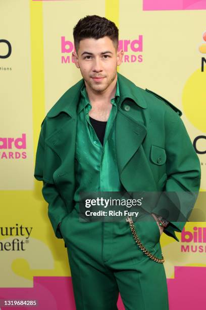 Nick Jonas poses backstage for the 2021 Billboard Music Awards, broadcast on May 23, 2021 at Microsoft Theater in Los Angeles, California.