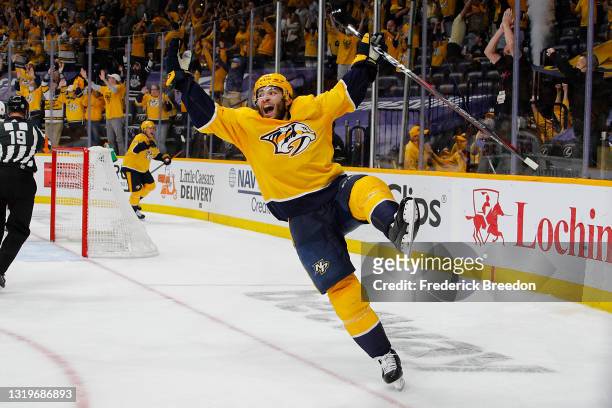 Luke Kunin of the Nashville Predators reacts after scoring the game winning goal against the Carolina Hurricanes during the second overtime period in...