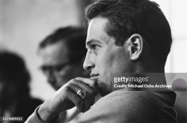 American actor Paul Newman listening to an unseen speaker at the Actors Studio in the Manhattan borough of New York City, New York, circa 1955.