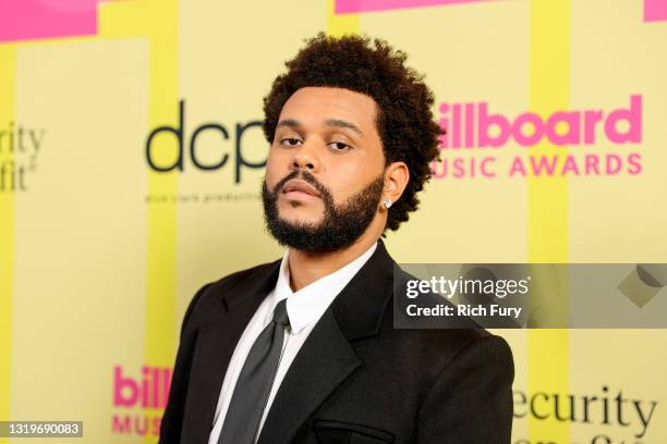 The Weeknd poses backstage for the 2021 Billboard Music Awards, broadcast on May 23, 2021 at Microsoft Theater in Los Angeles, California.