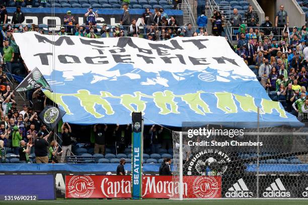 Fans cheer before the game between the Seattle Sounders and the Atlanta United at Lumen Field on May 23, 2021 in Seattle, Washington.