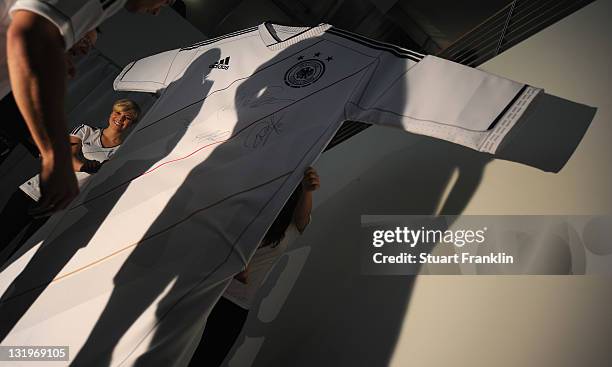 The new shirt at the German national team Euro 2012 jersey launch at teh Mercedes Benz center on November 9, 2011 in Hamburg, Germany.