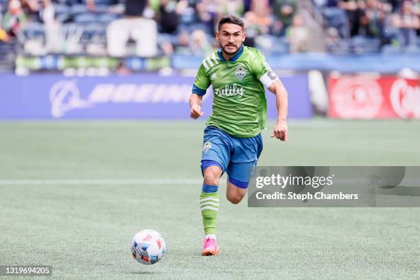 Cristian Roldan of Seattle Sounders controls the ball against the Atlanta United during the first half at Lumen Field on May 23, 2021 in Seattle,...