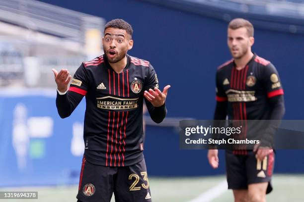 Jake Mulraney of Atlanta United reacts toward the official during the second half against the Seattle Sounders at Lumen Field on May 23, 2021 in...