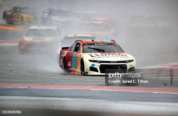 Chase Elliott, driver of the Llumar Chevrolet, leads the field during the NASCAR Cup Series EchoPark Texas Grand Prix at Circuit of The Americas on...
