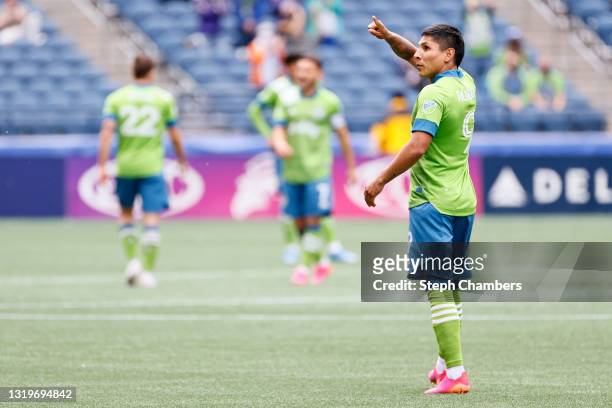 Raul Ruidiaz of Seattle Sounders celebrates his goal in the sixth minute against the Atlanta United at Lumen Field on May 23, 2021 in Seattle,...