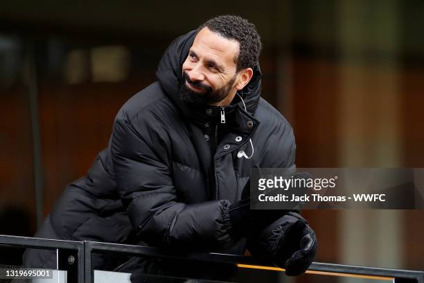 Rio Ferdinand looks on during the Premier League match between Wolverhampton Wanderers and Manchester United at Molineux on May 23, 2021 in...