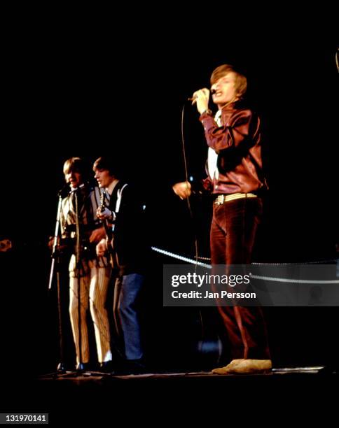 1st JANUARY: Herman's Hermits perform live on stage in Copenhagen, Denmark in January 1967. Left to right: bassist Karl Green, guitarist Keith...
