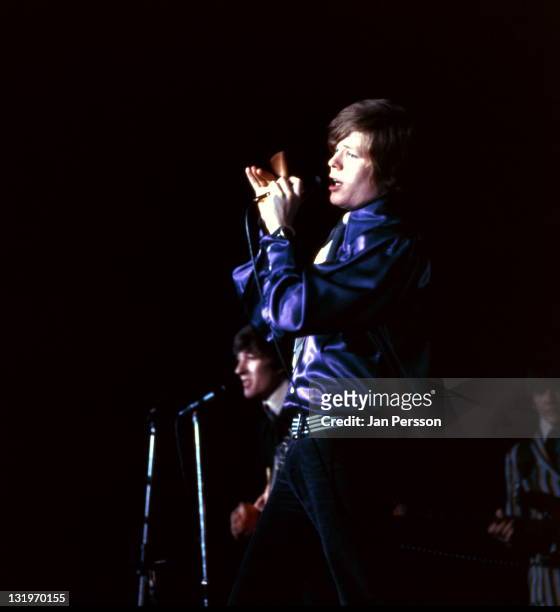 1st JANUARY: singer Peter Noone and guitarist Keith Hopwood of Herman's Hermits perform live on stage in Copenhagen, Denmark in January 1967. Bassist...
