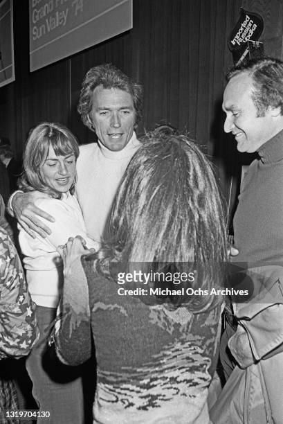 American actress Sondra Locke and American actor and film director Clint Eastwood with unspecified guests at the Pro-Am Lange Cup tournament, held at...