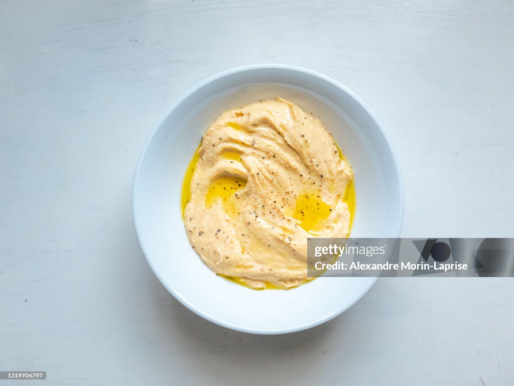 Delicious Hummus Prepared with Chickpeas, Garlic, Tahini, Lemon Juice, Salt, Olive Oil and Spices