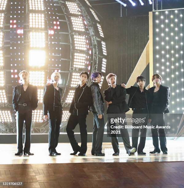 In this image released on May 23, Jimin, J-Hope, Jin, Jungkook, RM, Suga, and V of BTS perform for the 2021 Billboard Music Awards, broadcast on May...