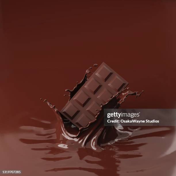 chocolate bar falling into melted chocolate splash. - liquid chocolate stock pictures, royalty-free photos & images
