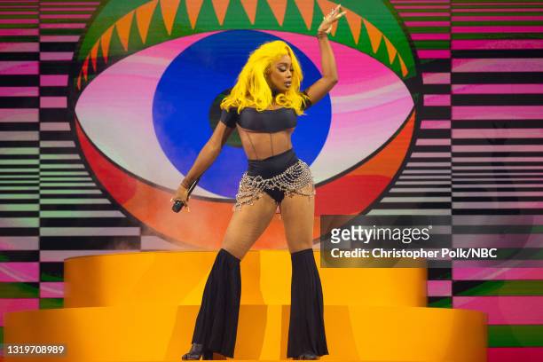 Pictured: In this image released on May 23, SZA performs on stage for the 2021 Billboard Music Awards, broadcast on May 23, 2021 at Microsoft Theater...