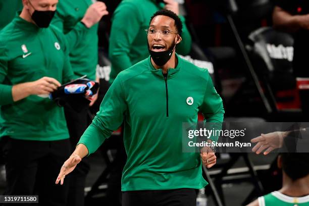 Assistant coach Evan Turner of the Boston Celtics encourages his team against the Brooklyn Nets in Game One of the First Round of the 2021 NBA...