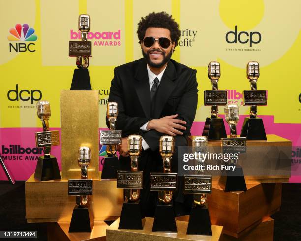 The Weeknd, winner of the Top Artist Award, Top Male Artist Award, Top Hot 100 Artist Award, Top Radio Songs Artist Award, Top R&B Artist Award, Top...