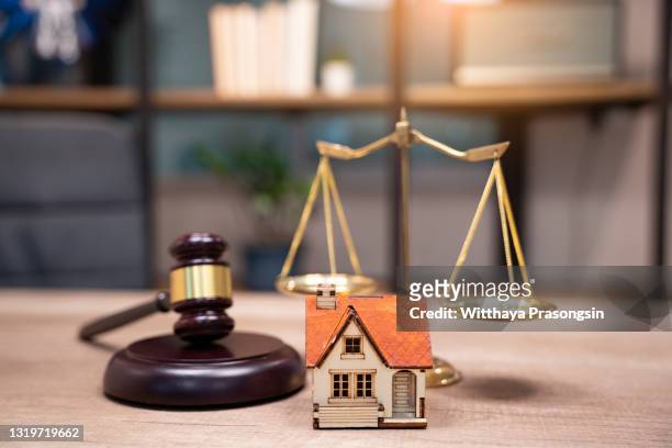 gavel wooden and house for home buying or selling of bidding or lawyer of home real estate and building concept. - auction table stock pictures, royalty-free photos & images