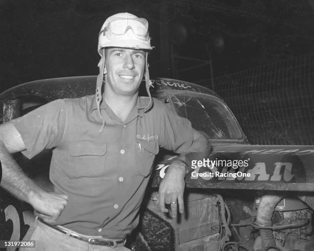 Ned Jarrett at Greensboro Fairgrounds with one of the cars he used to finish second in the NASCAR Sportsman division points. He would go on to win...