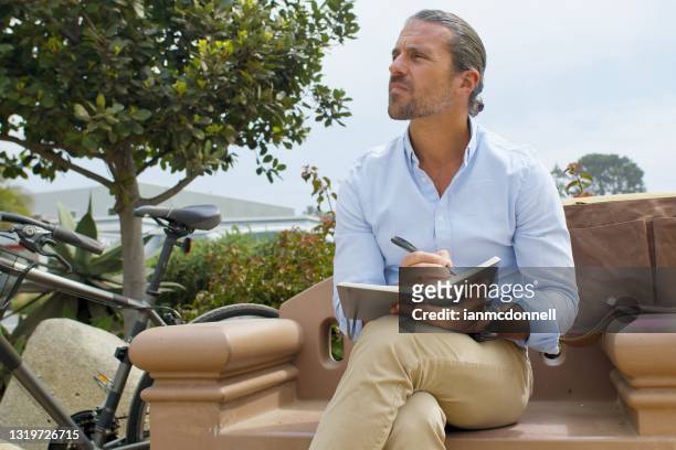 taking a break - khaki trousers stock pictures, royalty-free photos & images