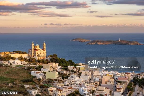 view from ano syros to the houses of ermoupoli with the anastasi church or church of the resurrection, evening light, view over the sea with the islands in front of ermoupoli, ano syros, syros, cyclades, greece - syros stock pictures, royalty-free photos & images