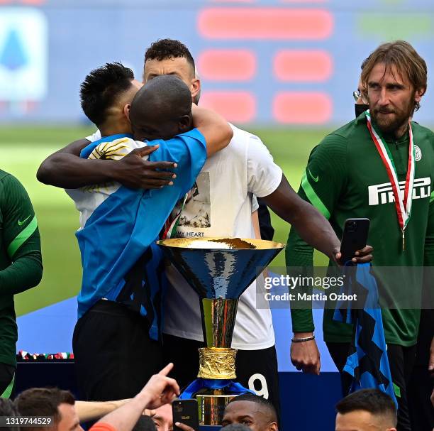 Players of FC Internazionale celebrate the trophy for the victory of nineteenth "scudetto" at the end of the Serie A match between FC Internazionale...
