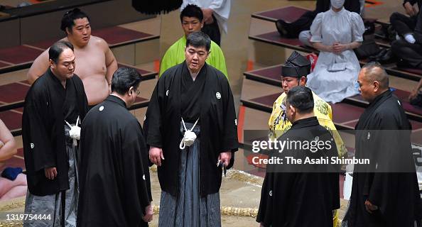 Sumo Judge Judges discuss on the result of the bout between ozeki Terunofuji and ...