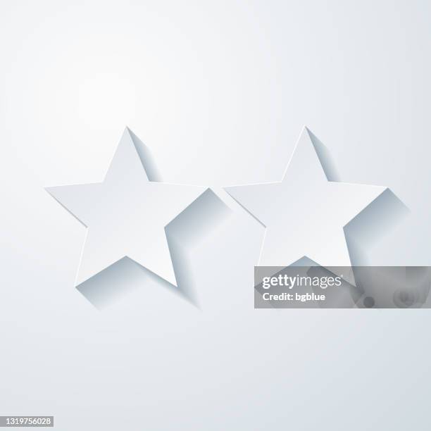 zwei sterne. icon mit papierschnitteffekt auf leerem hintergrund - 3d stars stock-grafiken, -clipart, -cartoons und -symbole