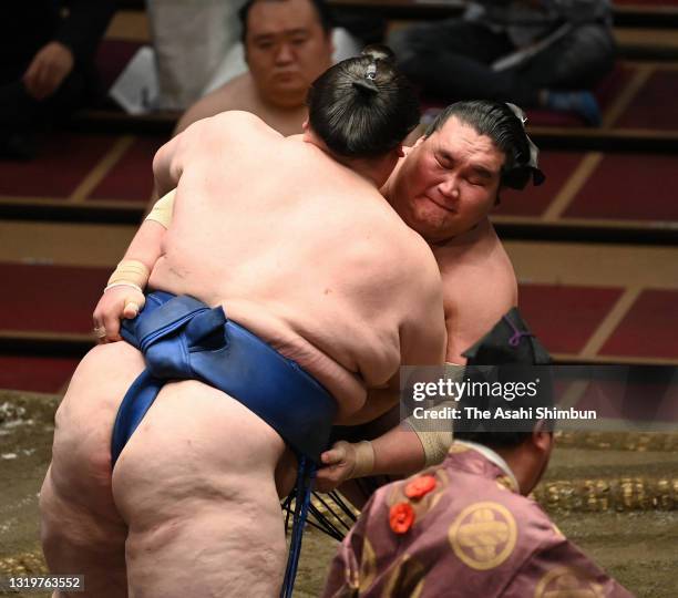 Ozeki Terunofuji and Ichinojo compete during day thirteen of the Grand Sumo Summer Tournament at Ryogoku Kokugikan on May 21, 2021 in Tokyo, Japan.