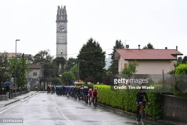 The peloton passing through Fregona Village landscape during the 104th Giro d'Italia 2021, Stage 16 a 153km stage shortened due to bad weather...