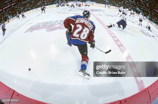 Steve Reinprecht, Center for the Colorado Avalanche warms up on the ice before the NHL Western Conference Northwest Division game against the...