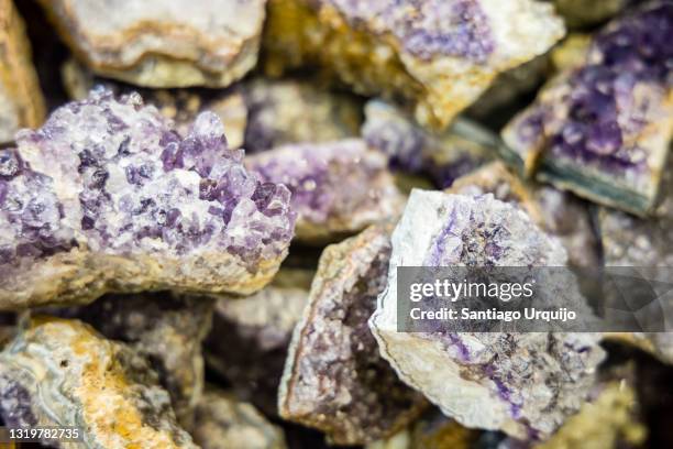 close-up of amethyst cluster crystals - amethyst stock pictures, royalty-free photos & images