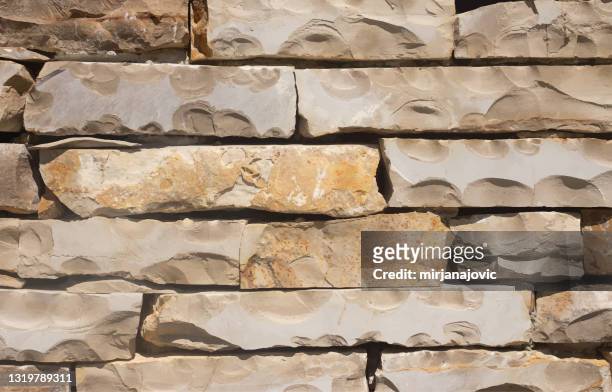 stone blocks brick wall textured background - stone wall stock illustrations