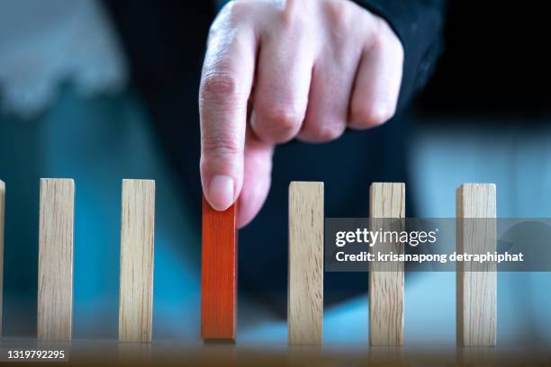 domino,wooden block,business risk, strategy and planing concept idea. - accident constant ストックフォトと画像