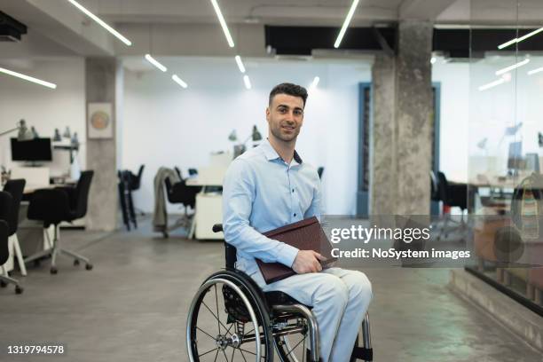 portrait of a businessman in a wheelchair - man in wheelchair stock pictures, royalty-free photos & images