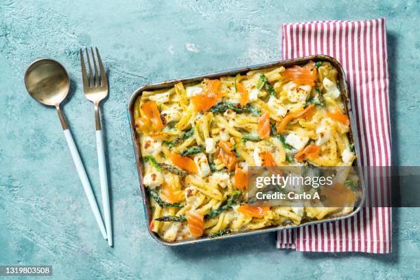 baked pasta with asparagus and salmon - casserole stock pictures, royalty-free photos & images