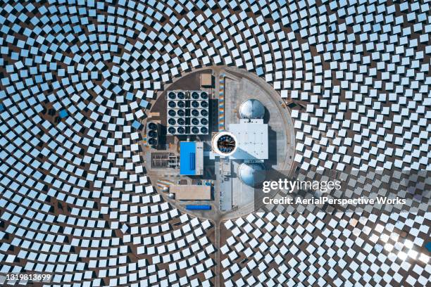 drone point view of solar and thermal panels - utility stock pictures, royalty-free photos & images