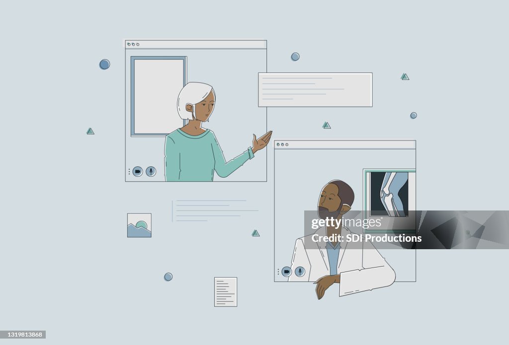 Male doctor discusses patient's x-ray