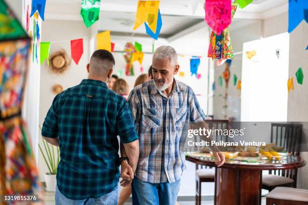 family dancing at the festa junina - june festival stock pictures, royalty-free photos & images