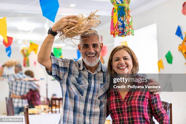 portrait of couple with plaid shirt - june festival stock pictures, royalty-free photos & images