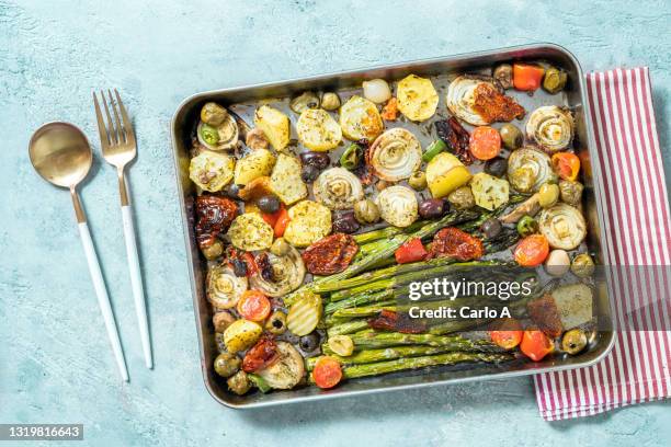 roasted asparagus and potatoes - vegetable tray stock pictures, royalty-free photos & images