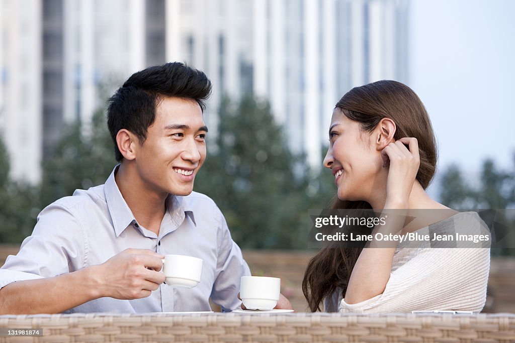 Couple Relaxing at a Cafe