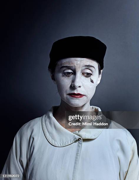 sad mime artist with dramatic lighting - mime stock pictures, royalty-free photos & images