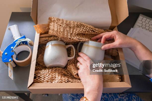 packaging coffee mugs - packaging stock pictures, royalty-free photos & images