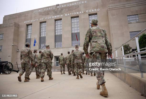 National Guard troops arrive at the Armory after ending their mission of providing security to the U.S. Capitol on May 24, 2021 in Washington, DC....