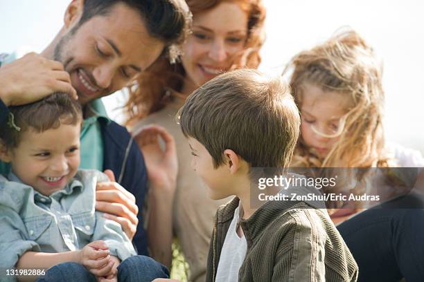 family spending time together outdoors - large family bildbanksfoton och bilder