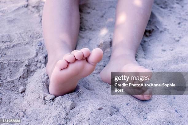 legs of little girl in sand, low section - feet of anne stock pictures, royalty-free photos & images