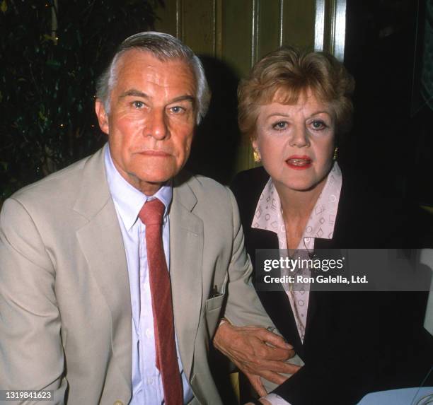 Peter Shaw and Angela Lansbury attends Italiana Television Honors Luncheon at Chasen's Restaurant in Beverly Hills, California on October 14, 1988.
