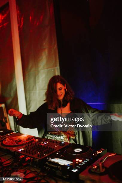 portrait of the young and beautiful female deejay - coat music festival stock pictures, royalty-free photos & images