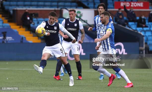 Danny Mullen of Dundee shoots at goal watched by Kirk Broadfoot during the Scottish Premiership Playoff Final 2nd Leg between Kilmarnock and Dundee...